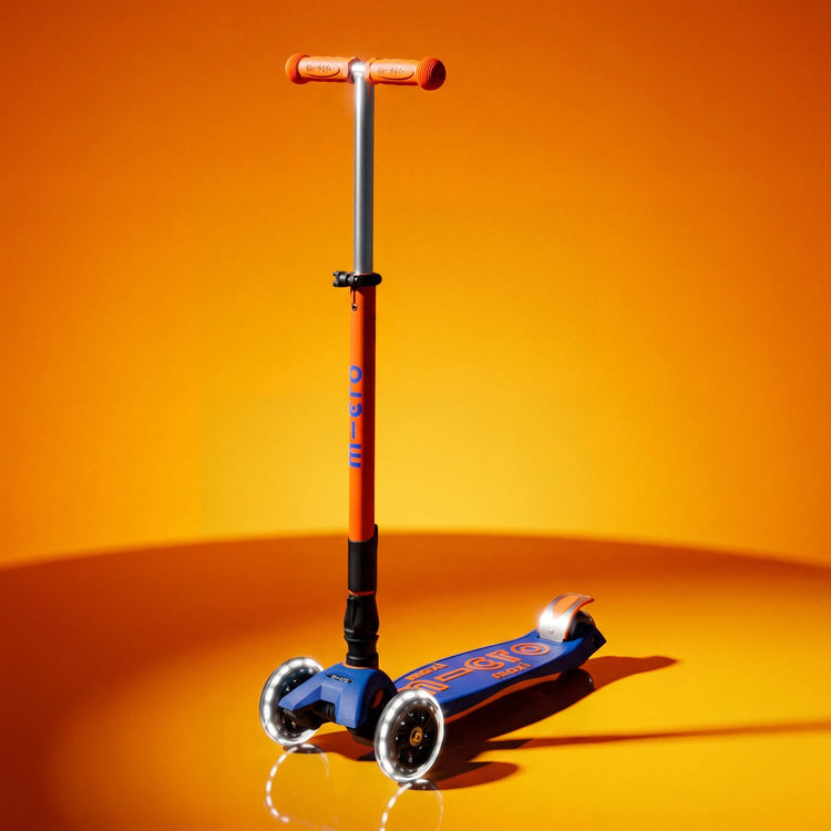 Micro Maxi Deluxe LED løbehjul til børn – Neon Blaze Orange